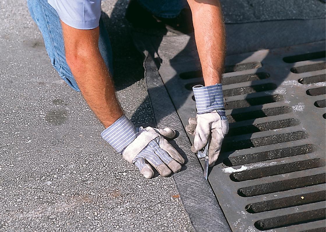 ultra drain guard being installed