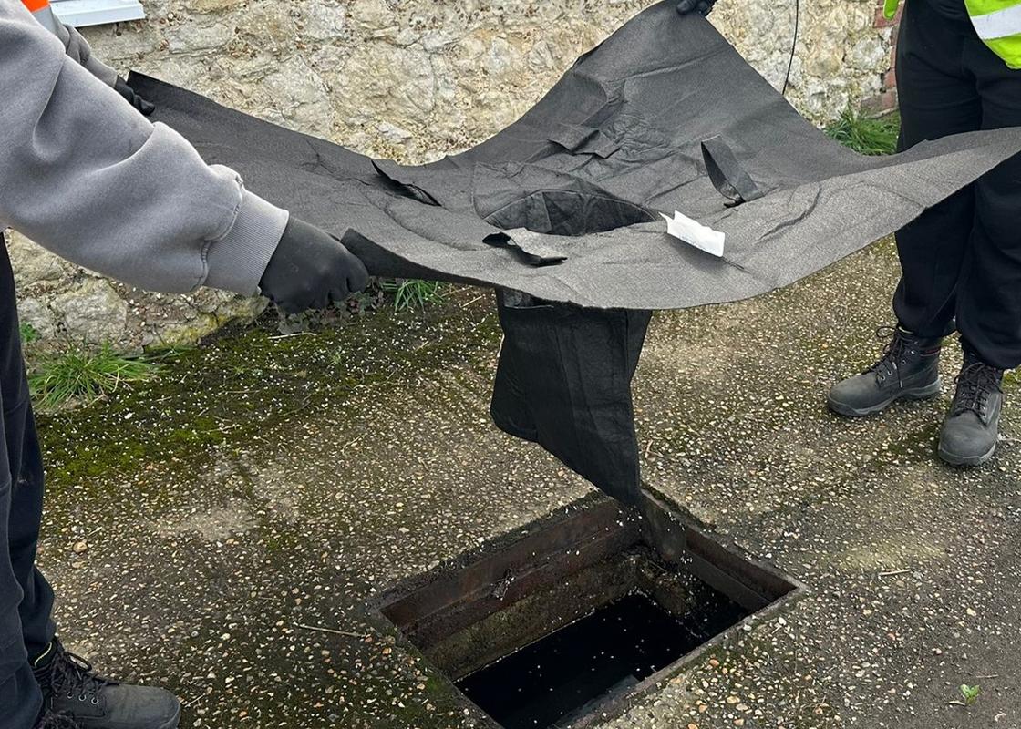 ultra drain guard being installed