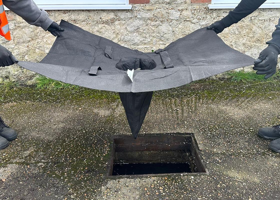 ultra drain guard being installed