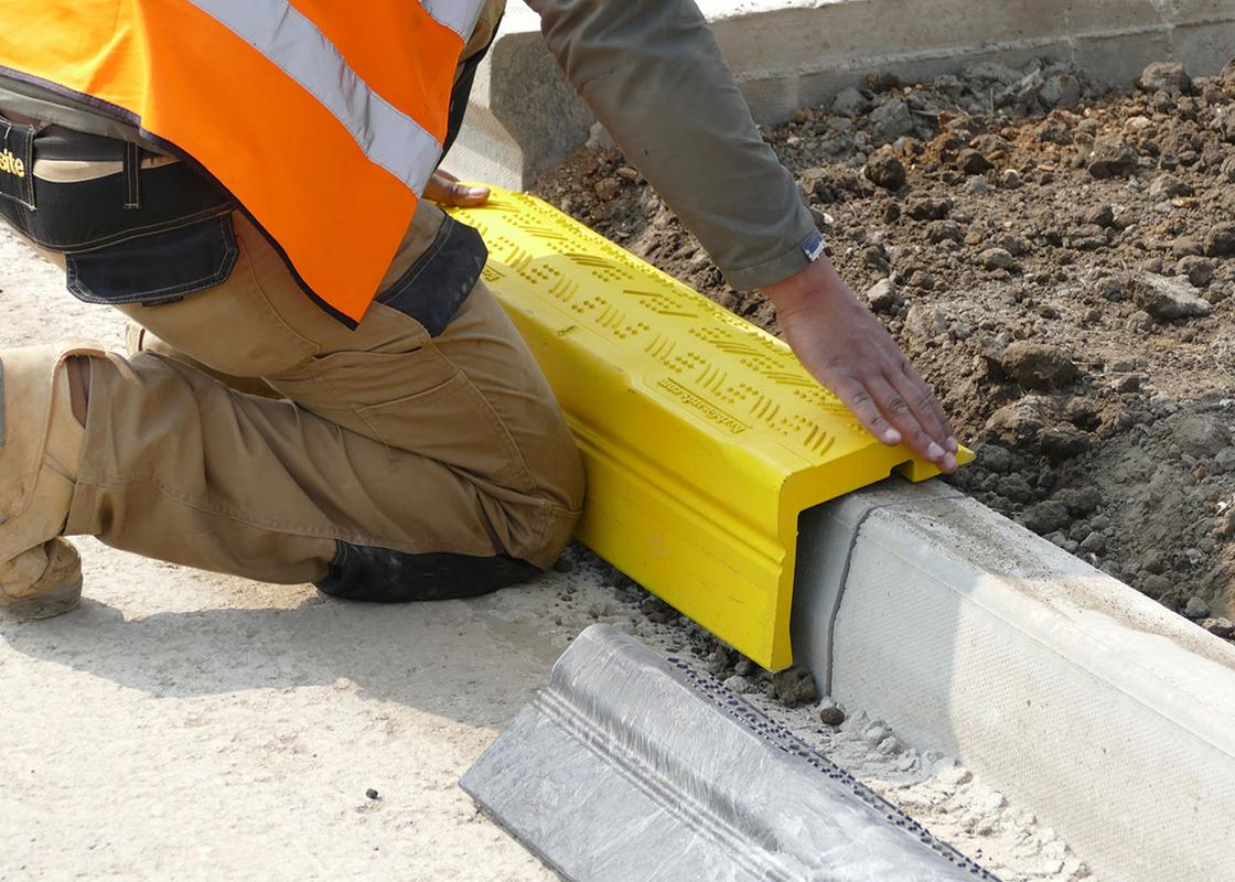 Heavy Duty Kerb Guard Temporary Protection being installed