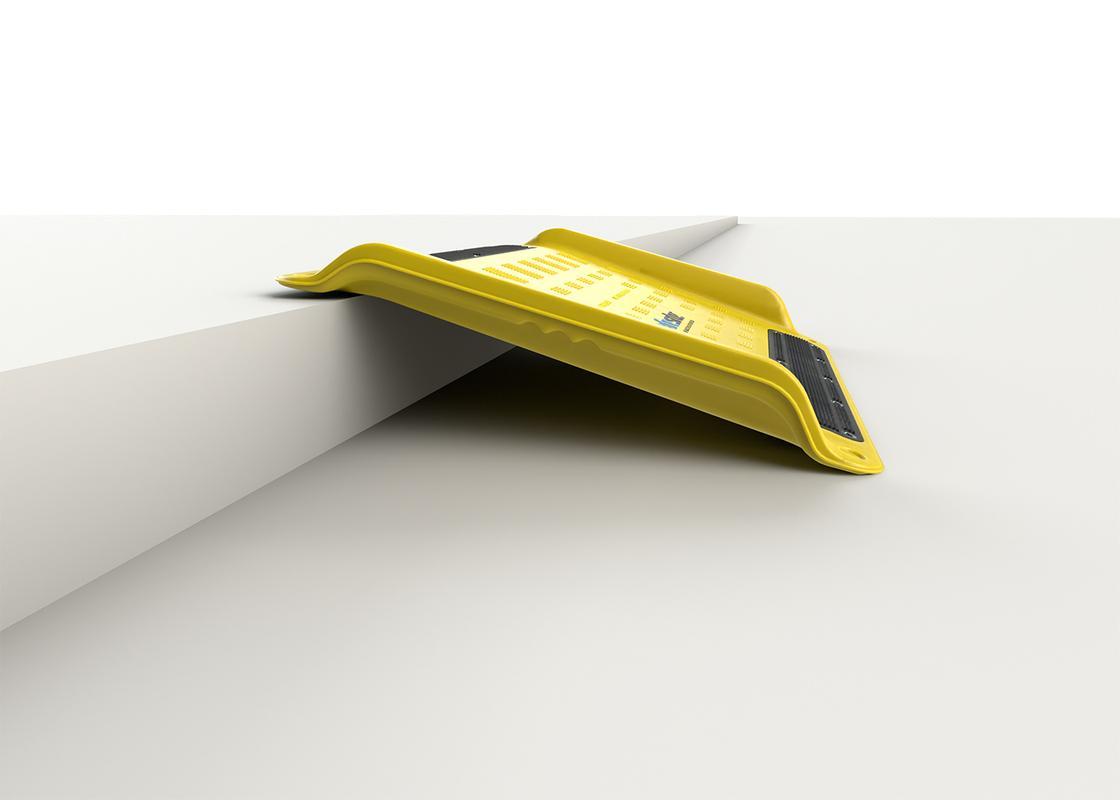 wheelchair kerb ramp on kerb - side view