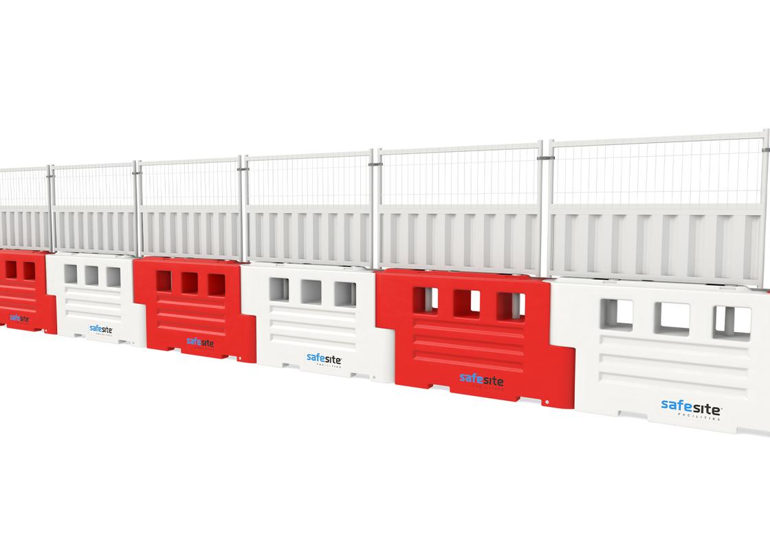 rb2000 barriers attached half hoarding and half mesh in a line