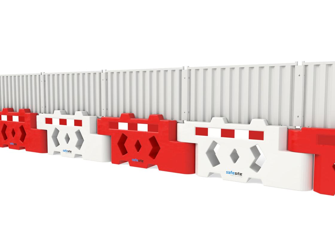 bison hoarding panels attached to a line of bison barriers