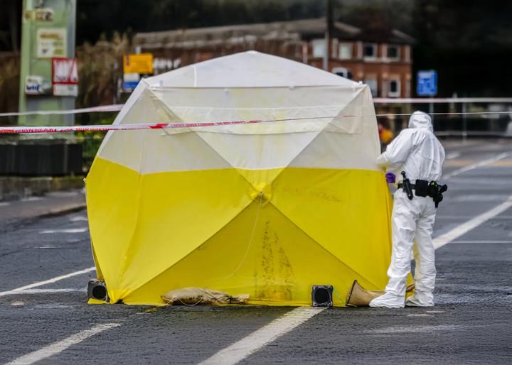 crime scene with tape being used to restrict area