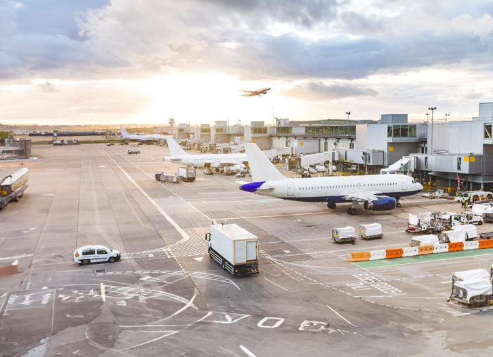 Planes docked at airport terminal