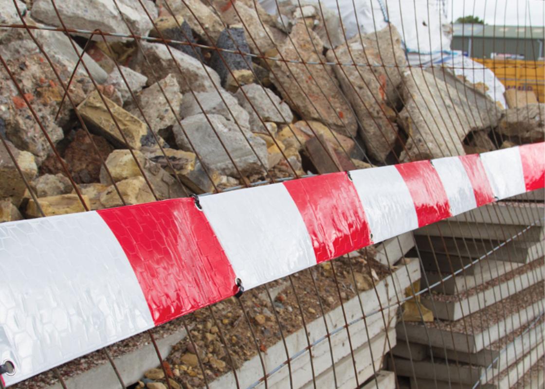 Fencebrite fencing strip (red and white) attached to fencing